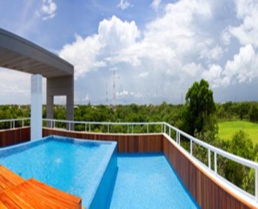 nick price residences view of a golf course playa del carmen real estate