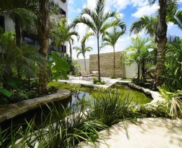 m playa del carmen real estate arenis garden with pond