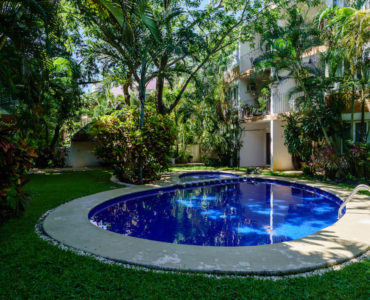 q condos for sale in playacar la concha common area pool