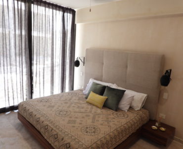 f amena luxury condos for sale in tulum master bedroom