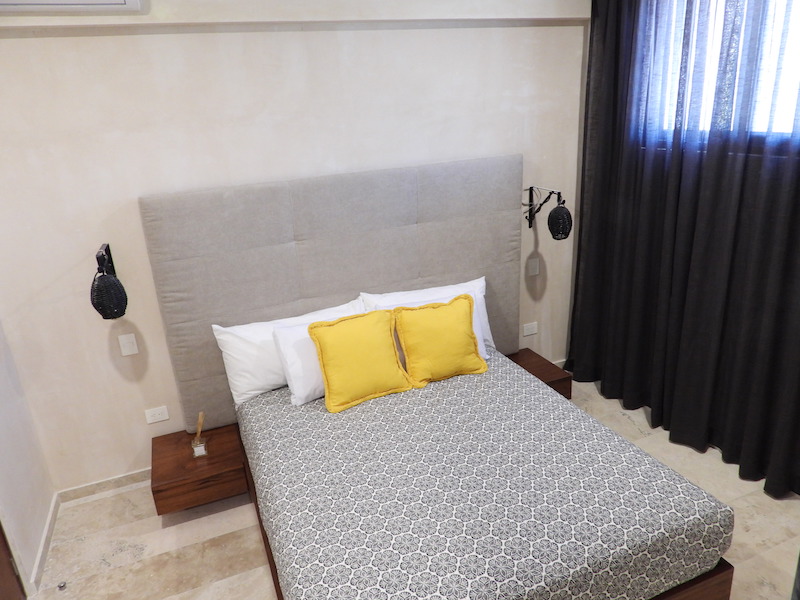 g amena luxury condos for sale in tulum guest bedroom