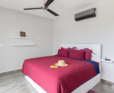 o houses for sale in tulum casa armonia pink bedroom