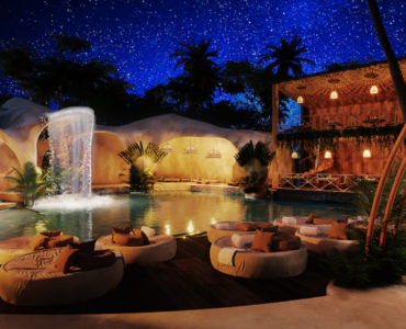 i houses for sale in tulum atman village common area at night