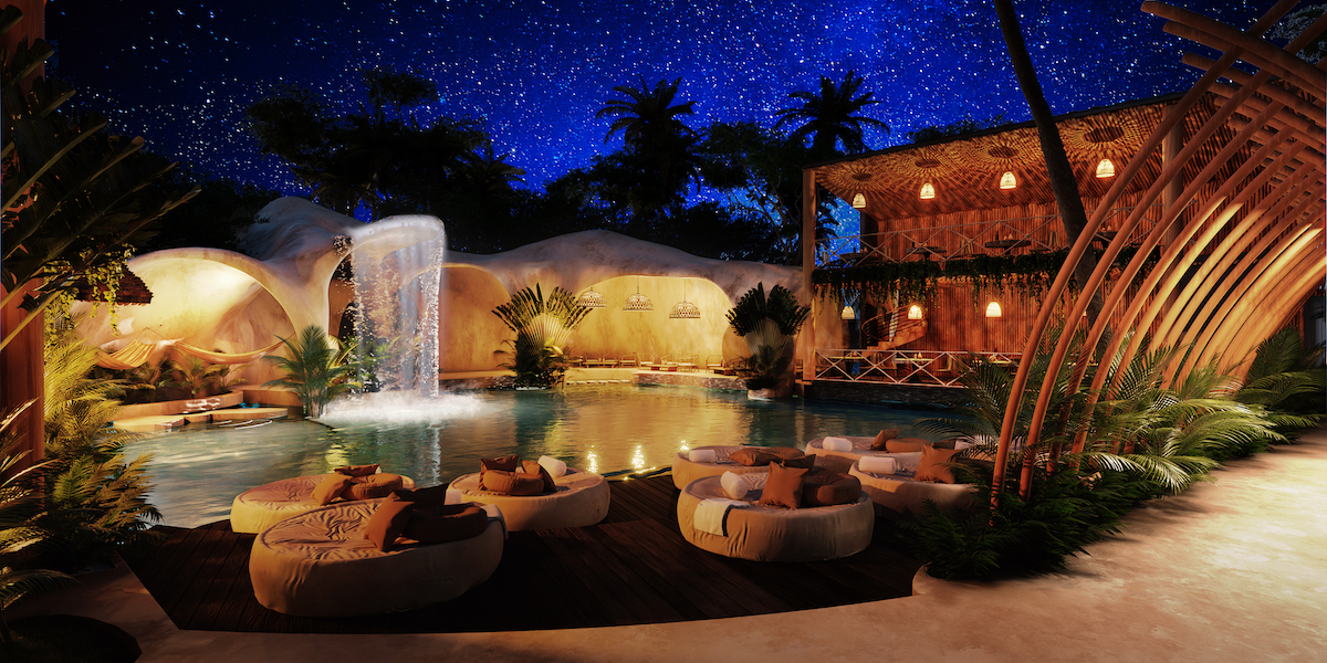 i houses for sale in tulum atman village common area at night