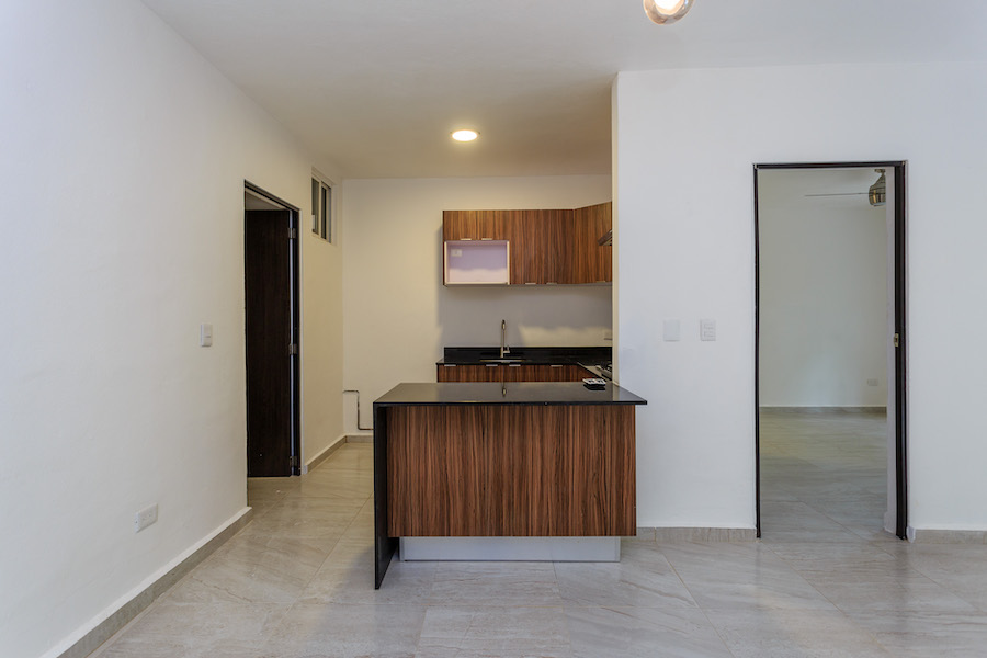 b condo for sale in playacar pakal living to kitchen