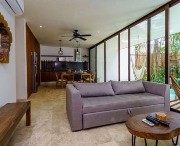 c tulum bienes raices bajo cielo sala a cocina