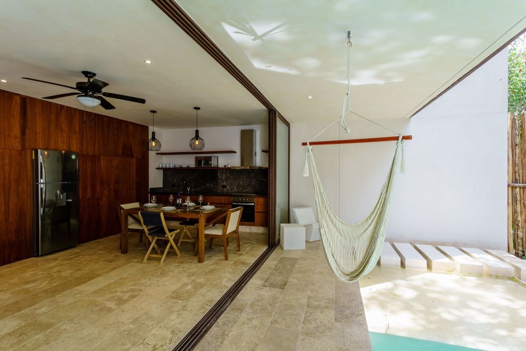 g tulum bienes raices bajo cielo sala a terraza