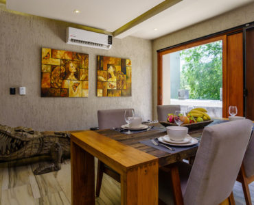 luxury real estate in aldea zama tulum art house dining room