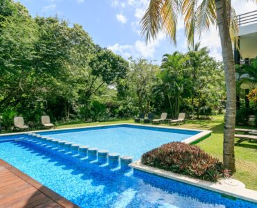 q bienes raices playacar akoya alberca