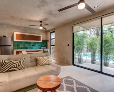 one bedroom ground floor condo tulum real estate sukha112 la veleta kitchen and living with terrace