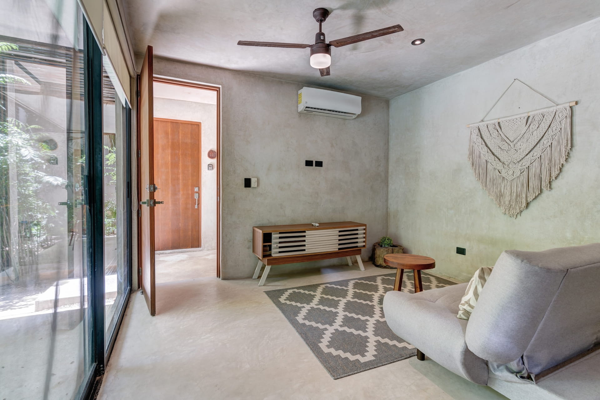 one bedroom ground floor condo tulum real estate sukha112 la veleta sala living with terrace