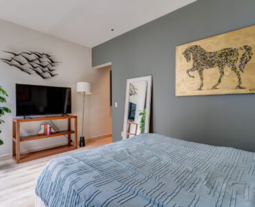condo for sale in playa del carmen musa del carmen bedroom with tv