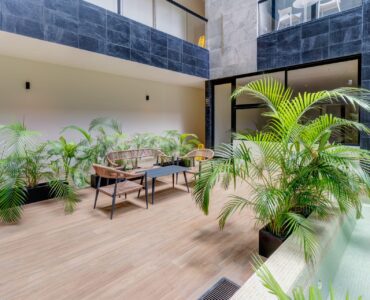 condo for sale in playa del carmen musa del carmen pool with chairs