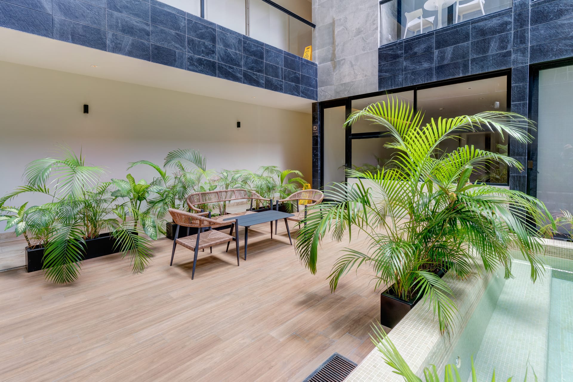 condo for sale in playa del carmen musa del carmen pool with chairs