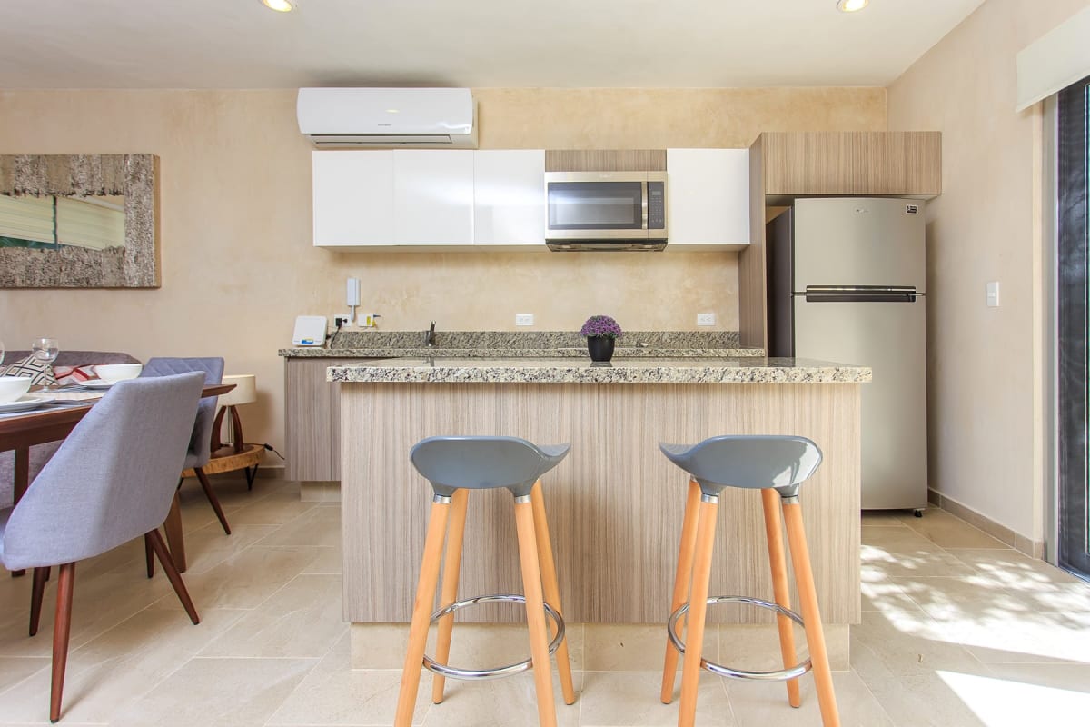 f condos for sale in tulum carmela island