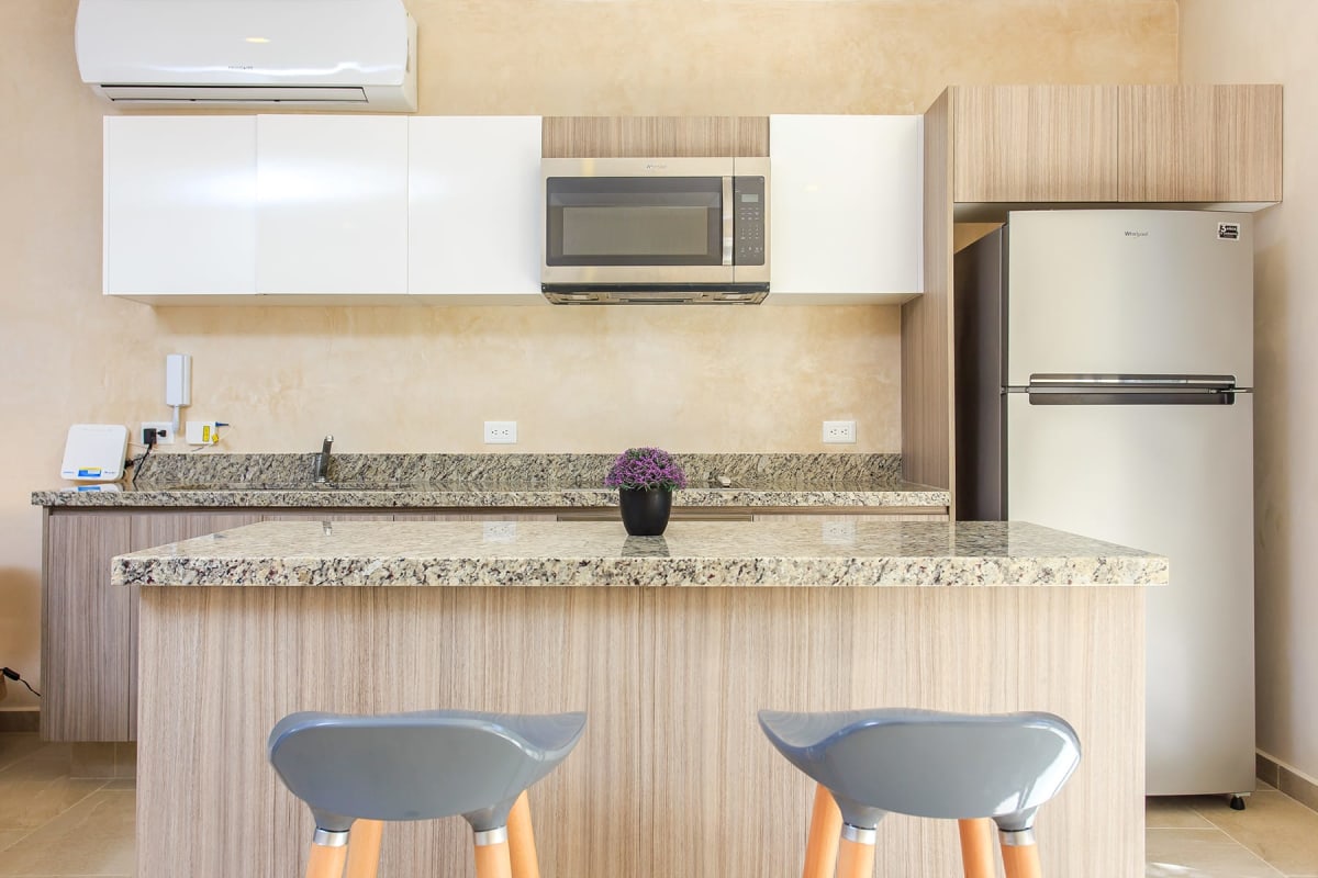g condos for sale in tulum carmela kitchen