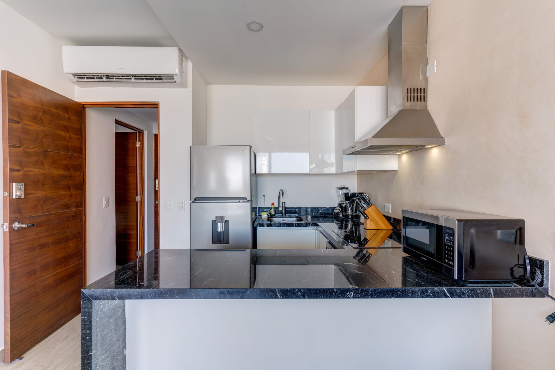 playa del carmen condos for sale 2 bedroom condo tzalam kitchen front view