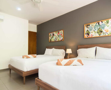 two bedroom ground floor condo in playa del carmen lunada guest room with two beds