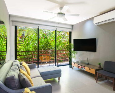 two bedroom ground floor condo in playa del carmen lunada living room with ac