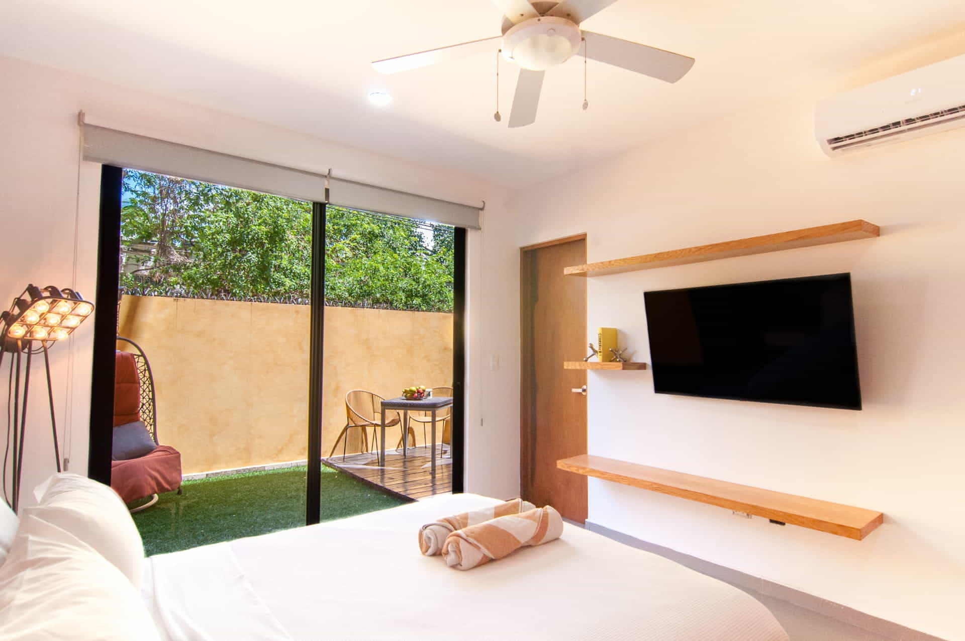 two bedroom ground floor condo in playa del carmen lunada master bedroom with tv