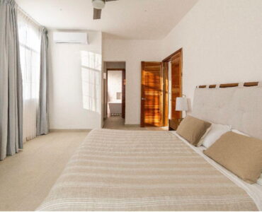 villa for sale in puerto aventuras villa miloba master bedroom with tv