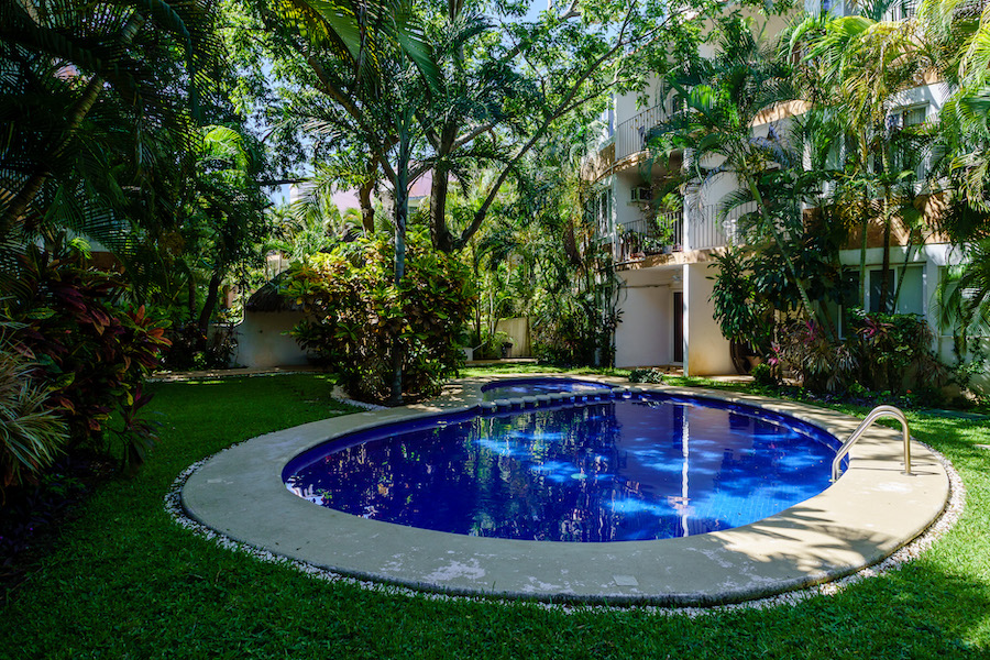 q condos for sale in playacar la concha common area pool