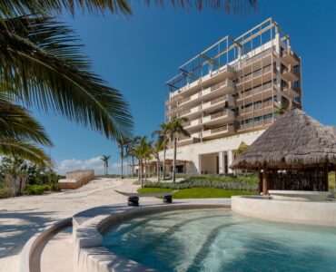 luxury playa del carmen real estate beachfront pool to building