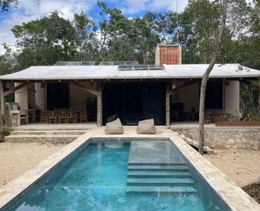 a houses for sale in tulum casa selva pool and house