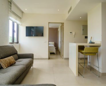 e golf course condos for sale in playa del carmen living area to bedroom