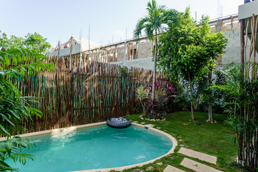 i ananas condo for sale in tulum swimming pool and garden
