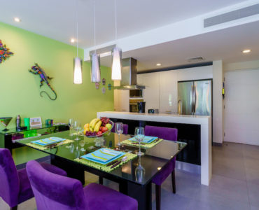 n golf course playa del carmen condos: nick price 2 bedroom dining and kitchen