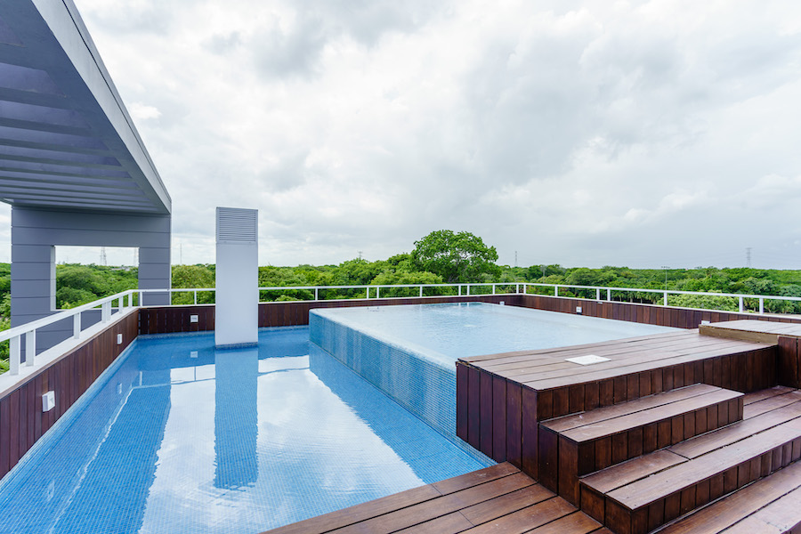 x golf course playa del carmen condos: nick price 2 bedroom rooftop