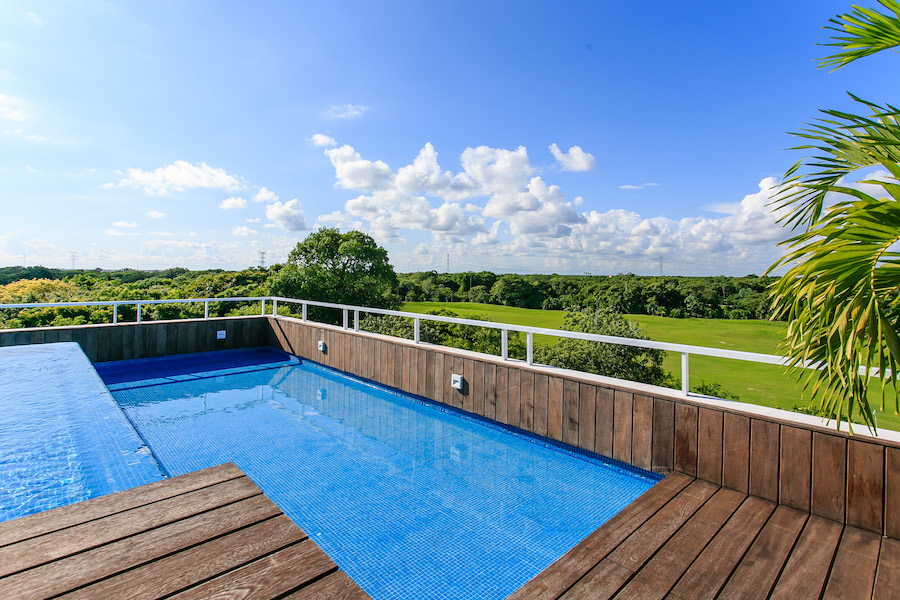 z golf course playa del carmen condos: nick price 2 bedroom rooftop pool