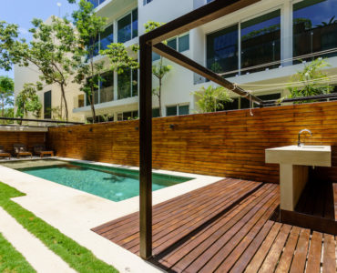 y condo for sale in aldea zama tulum oceano common areas