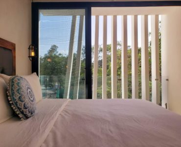 g tulum condos for sale sanctuary guest bed balcony