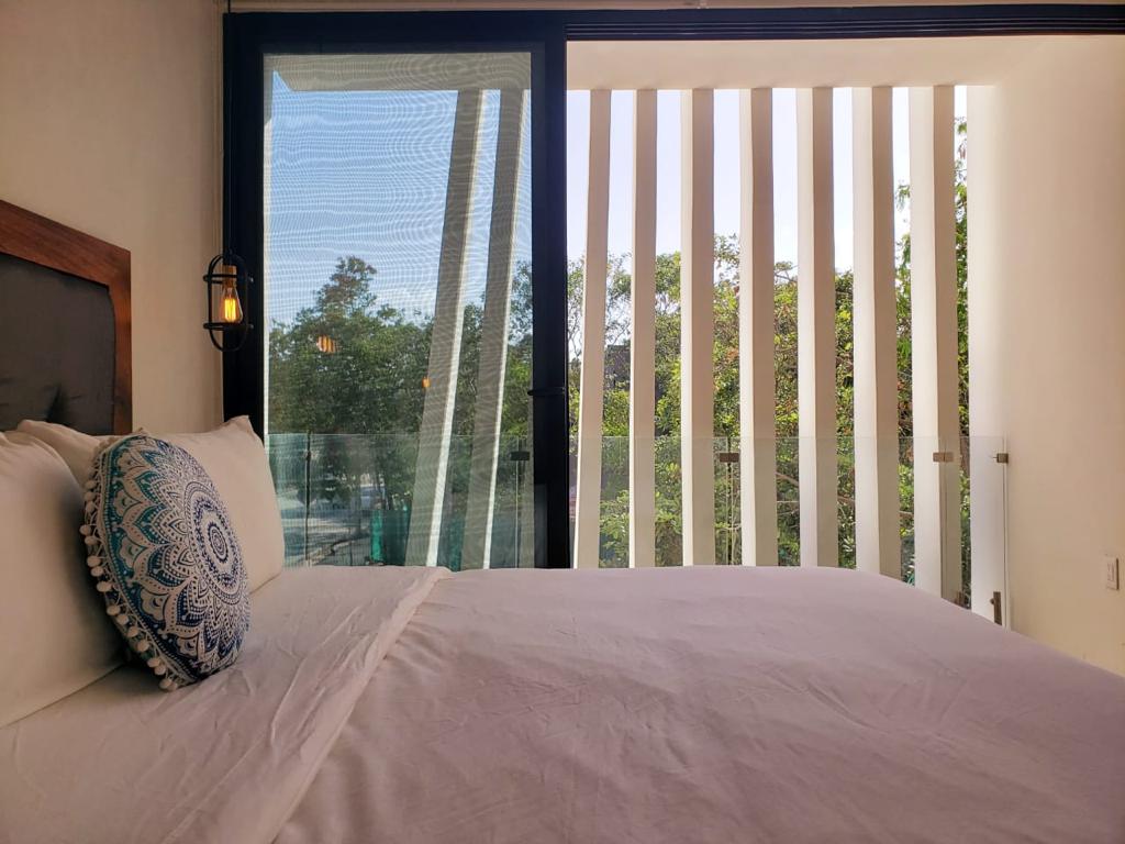 g tulum condos for sale sanctuary guest bed balcony