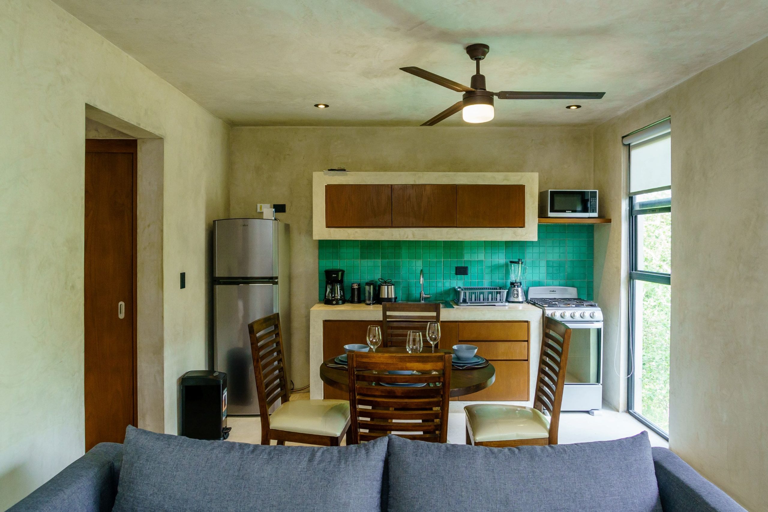 f tulum condos sukha penthouse dining area to kitchen