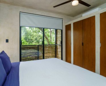 k tulum condos sukha penthouse bedroom and balcony