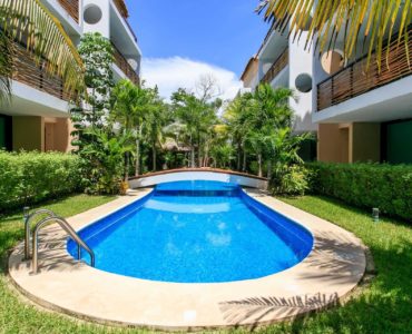 x apartments for sale in tulum encanto garden unit pool and tropical plants