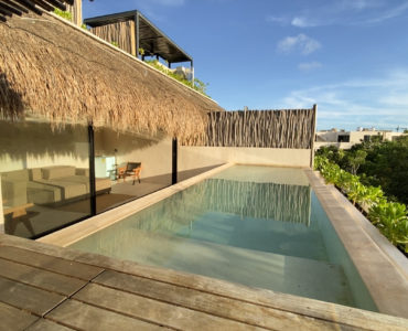 m essentia condos for sale aldea zama rooftop bedroom pool view