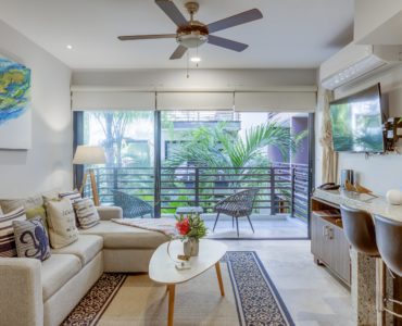 c playa del carmen condos arenis kitchen bar and living space