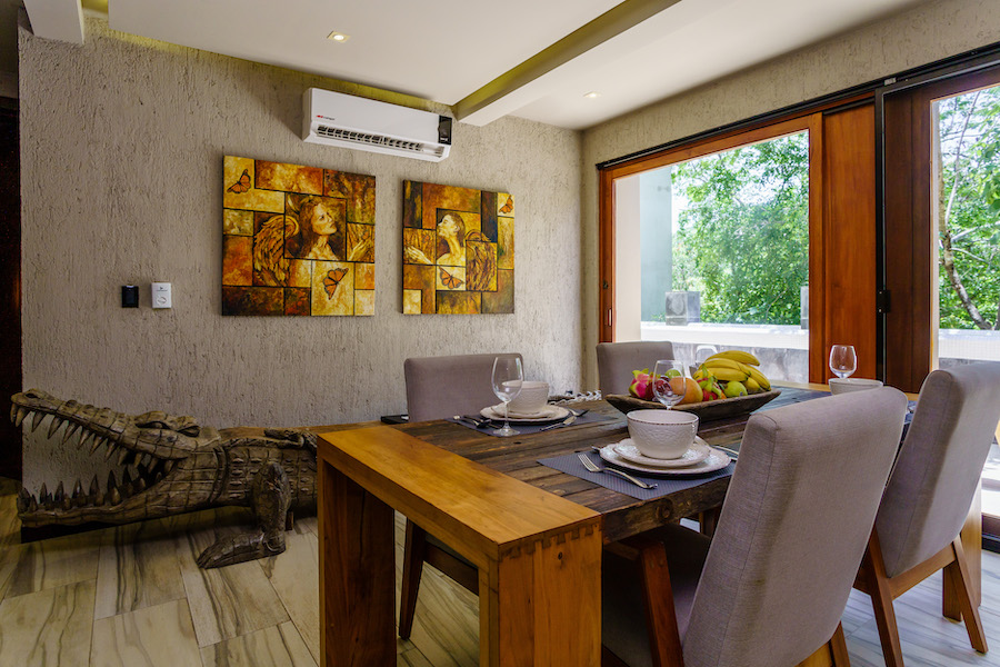 luxury real estate in aldea zama tulum art house dining room