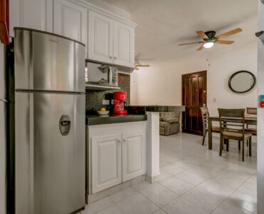 f apartment for sale in playacar gaviotas kitchen to dining area