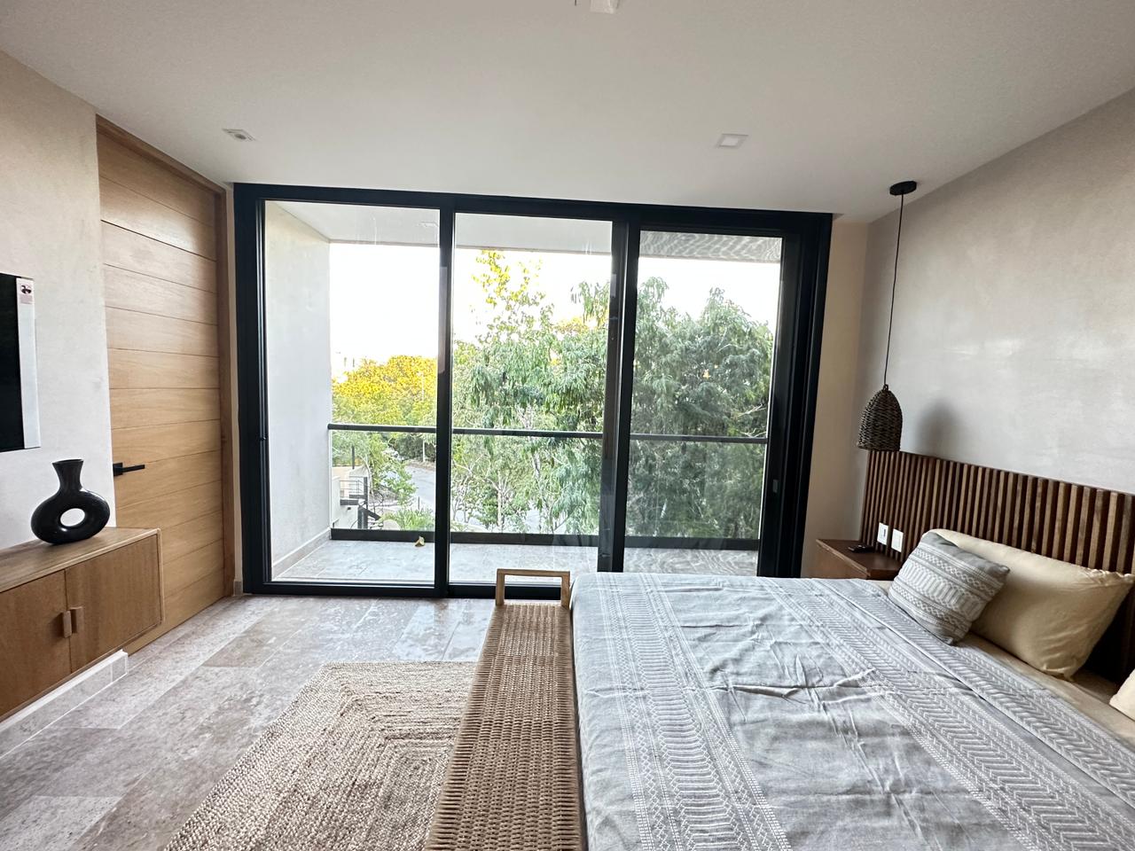 exclusive residences for sale in tulum the enclave bedroom with tv
