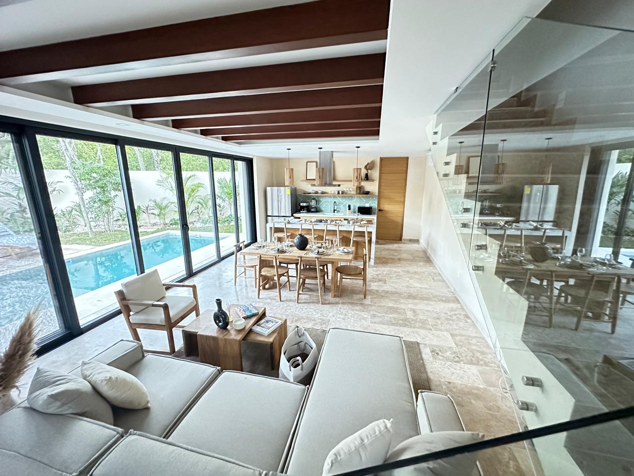 exclusive residences for sale in tulum the enclave living area and kitchen