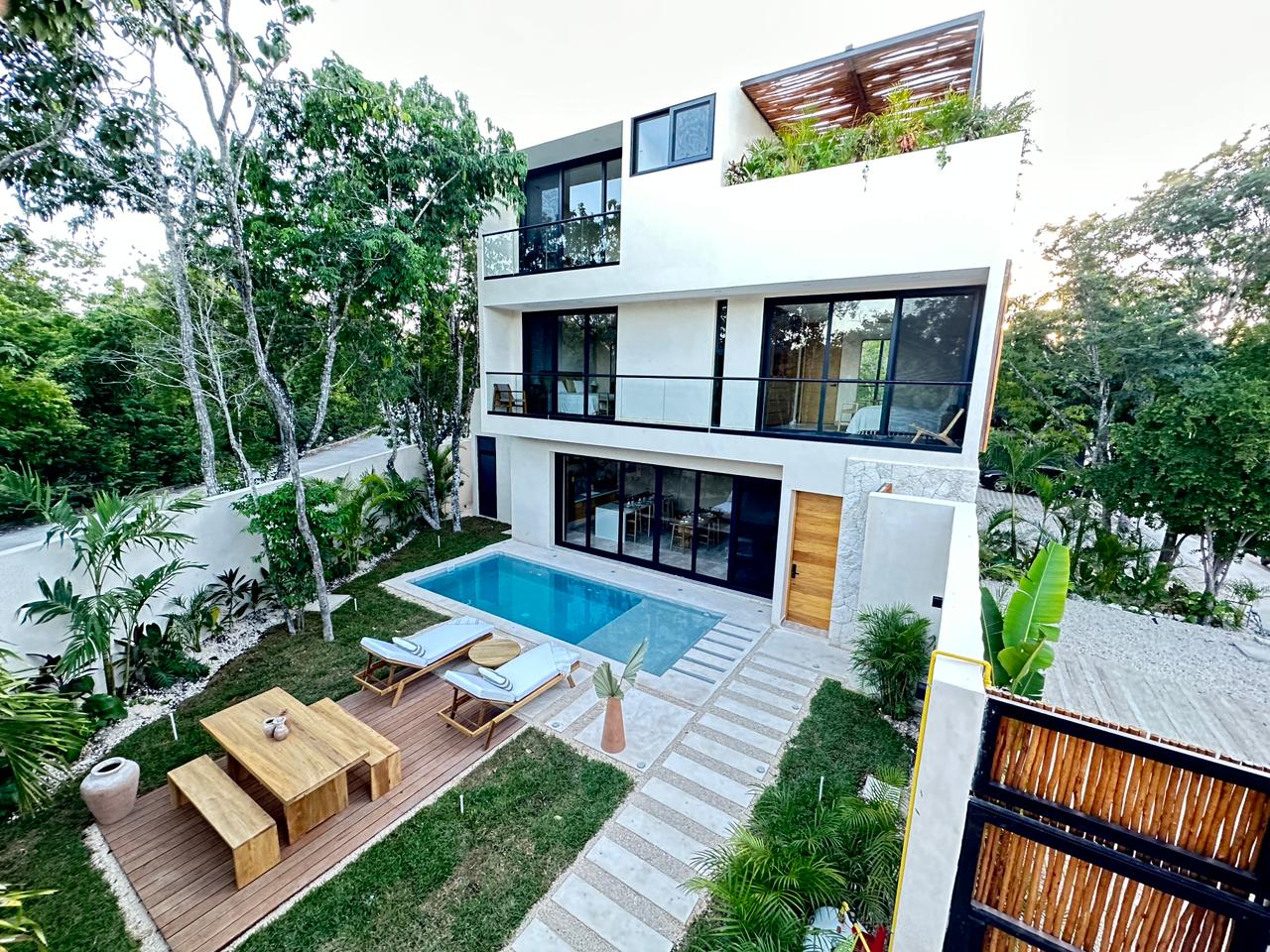 exclusive residences for sale in tulum the enclave private pool with deck and garden