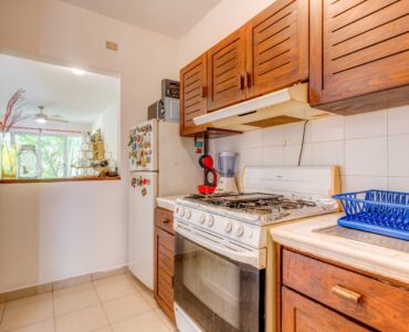 f real estate playacar playa del carmen la concha condo equipped kitchen