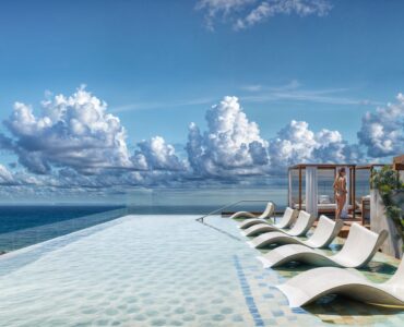 playa del carmen condo for sale macondo corazon skypool with sunbeds and palapas