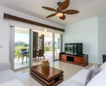 exclusive 2 bedroom condo for sale in mareazul playa del carmen living room with tv