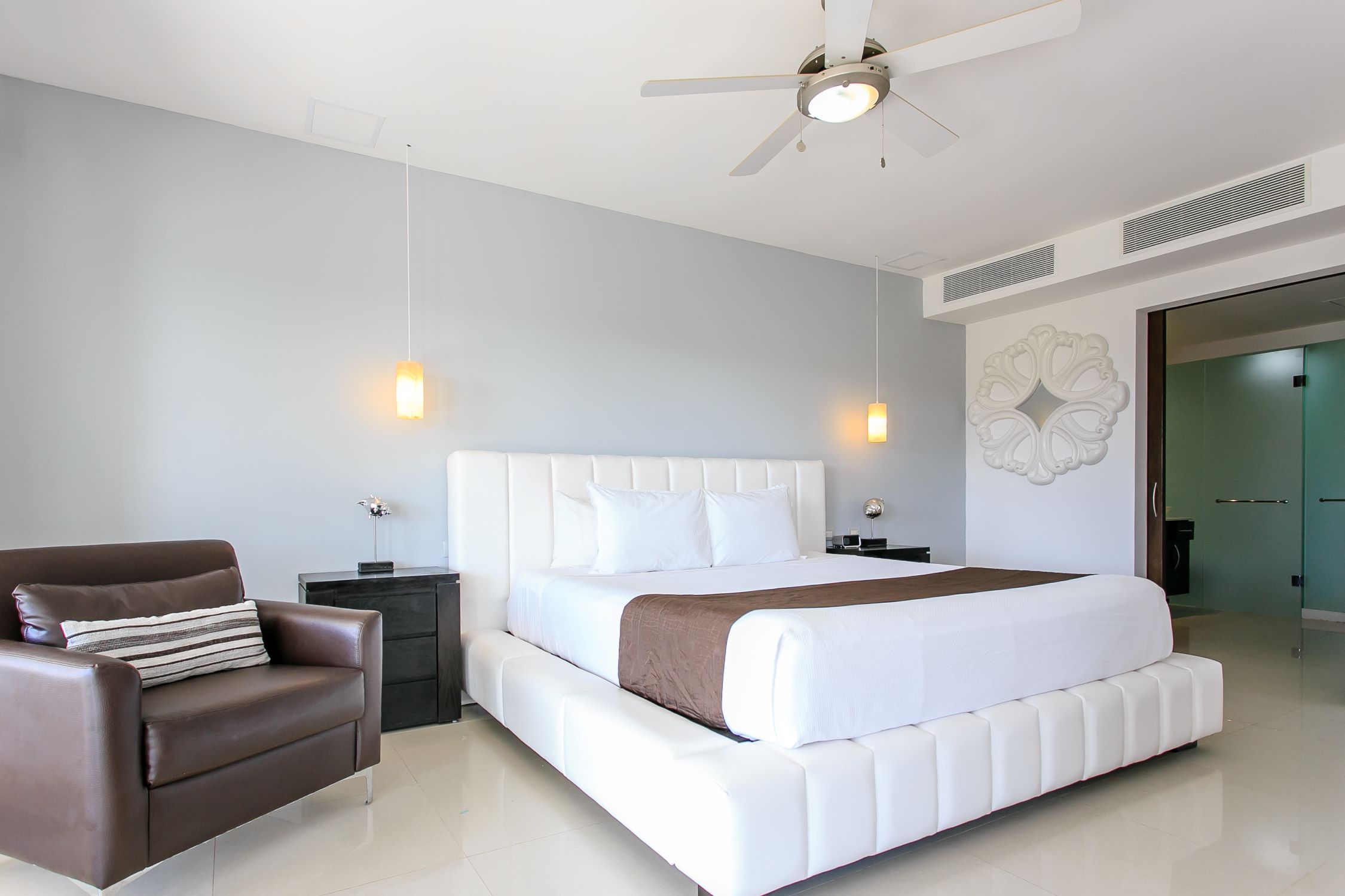 exclusive 2 bedroom condo for sale in mareazul playa del carmen master bedroom with sofa